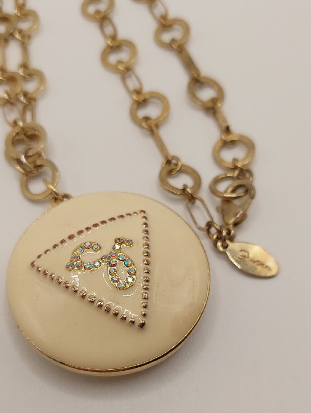 GUESS Blingy AB Gold-Tone Long Pendant Necklace with Cream Enamel Locket - Picture 3 of 14